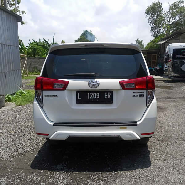 Back view Bali Car Charter - Toyota Innova 6-seater passenger.